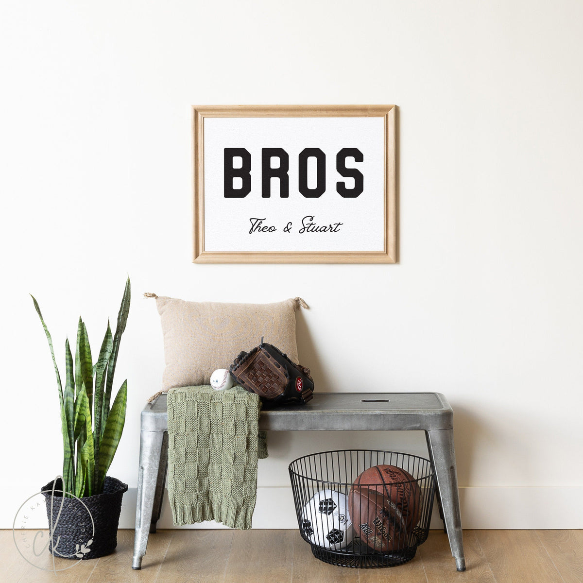 Personalized &amp;quot;BROS&amp;quot; sign for boys&amp;#39; room decor, featuring customizable names, displayed in a modern nursery setting with a metal bench, plant, and sports equipment.