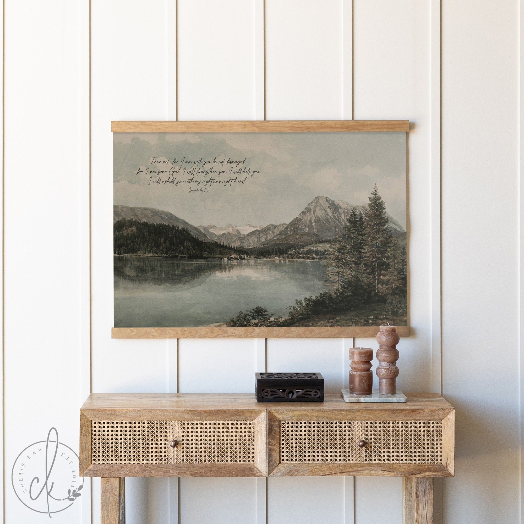 Beautiful landscape canvas tapestry featuring a tranquil lake surrounded by pine trees and mountains, with Scripture from Isaiah 41:10 written in elegant script.