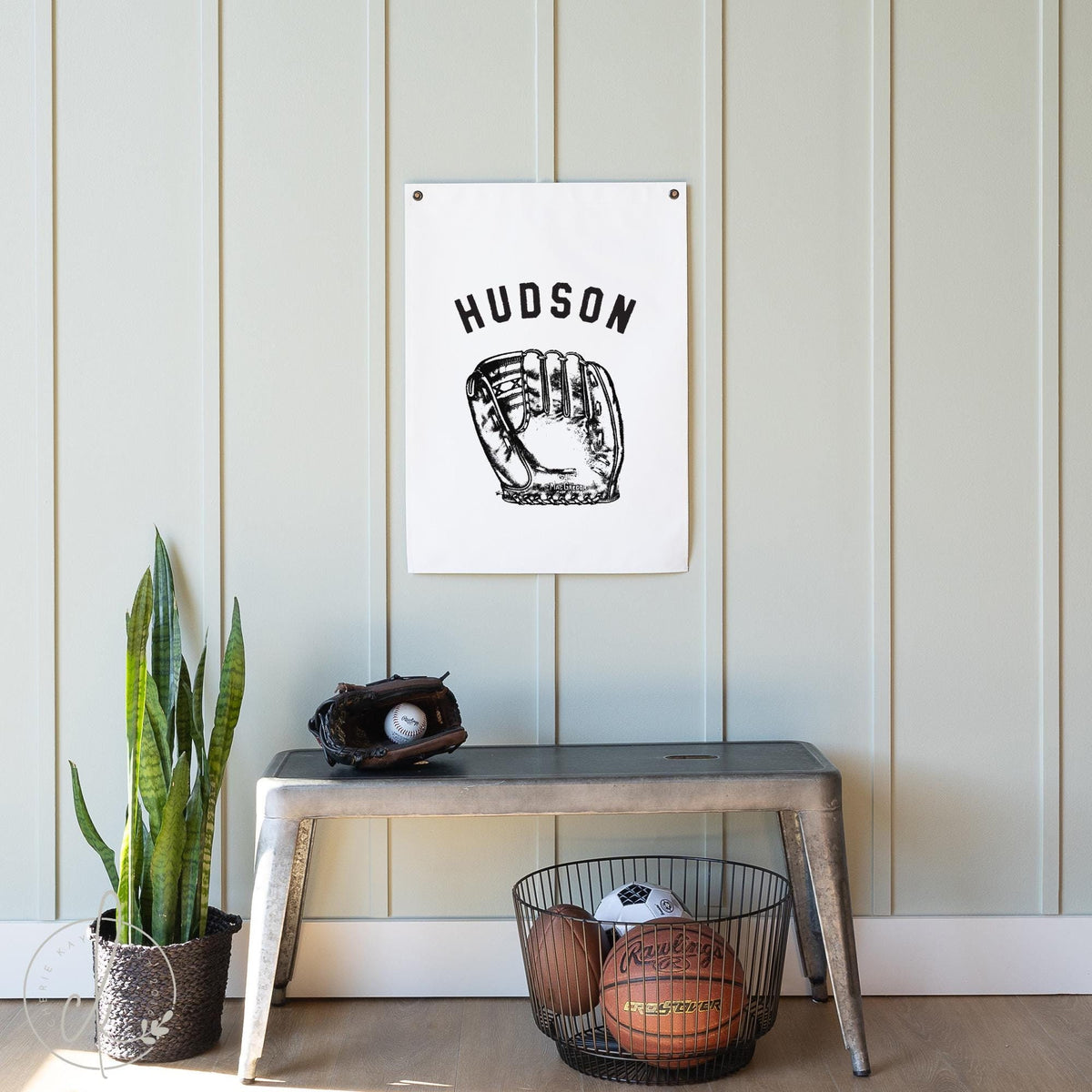 Personalized baseball glove canvas flag with custom name hanging on a wall in a boy&amp;#39;s room, ideal for nursery, bedroom, playroom, or teen&amp;#39;s room sports decor.