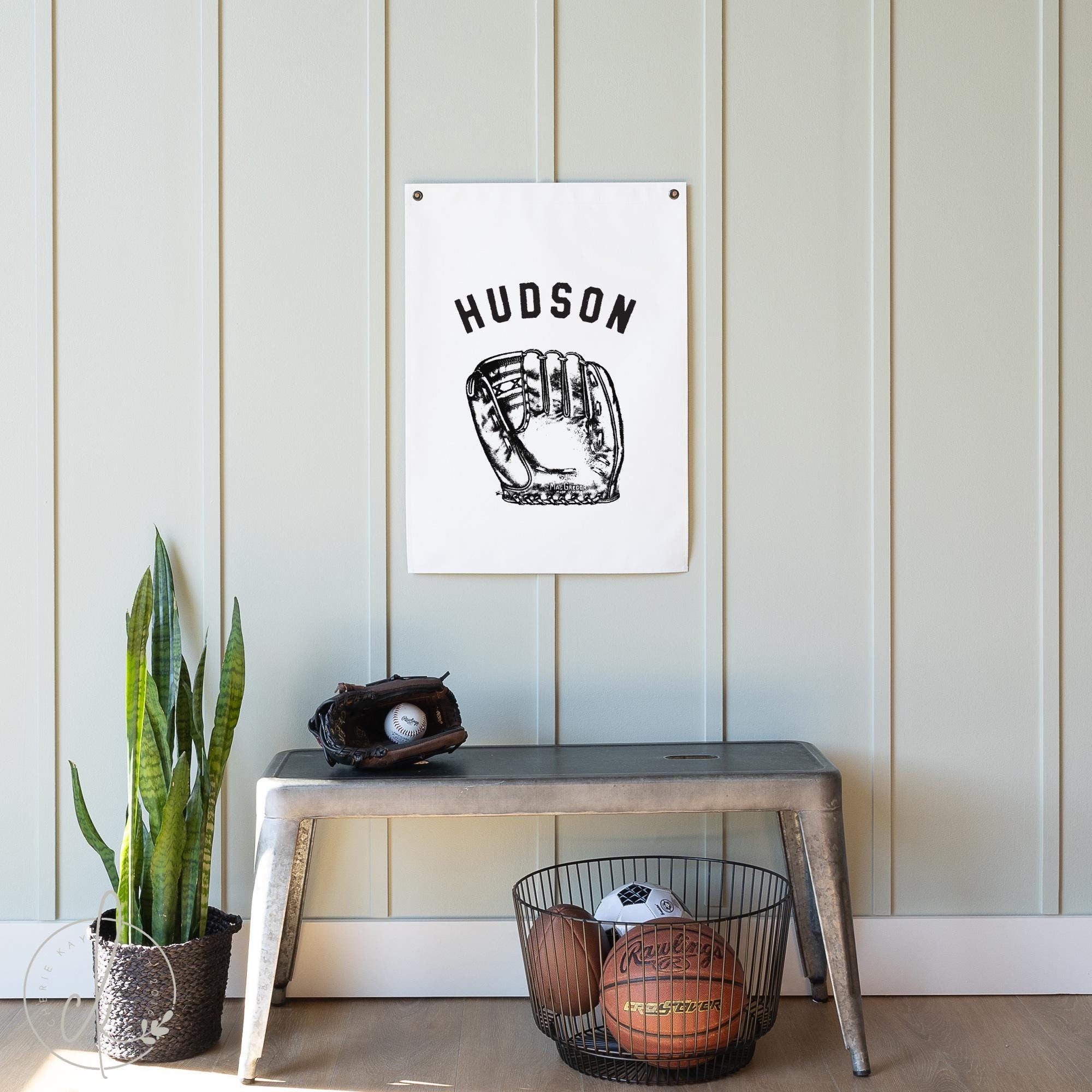 Personalized baseball glove canvas flag with custom name hanging on a wall in a boy&#39;s room, ideal for nursery, bedroom, playroom, or teen&#39;s room sports decor.